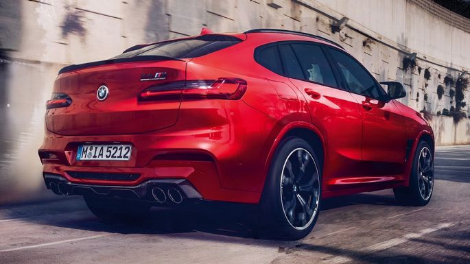 BMW X4 M, lateral rear view. BMW X4 M in Toronto Red metallic, exterior, lateral rear view.
