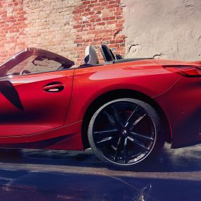 Side shot of the BMW Z4 Roadster Side shot of the BMW Z4 Roadster in front of a brick wall