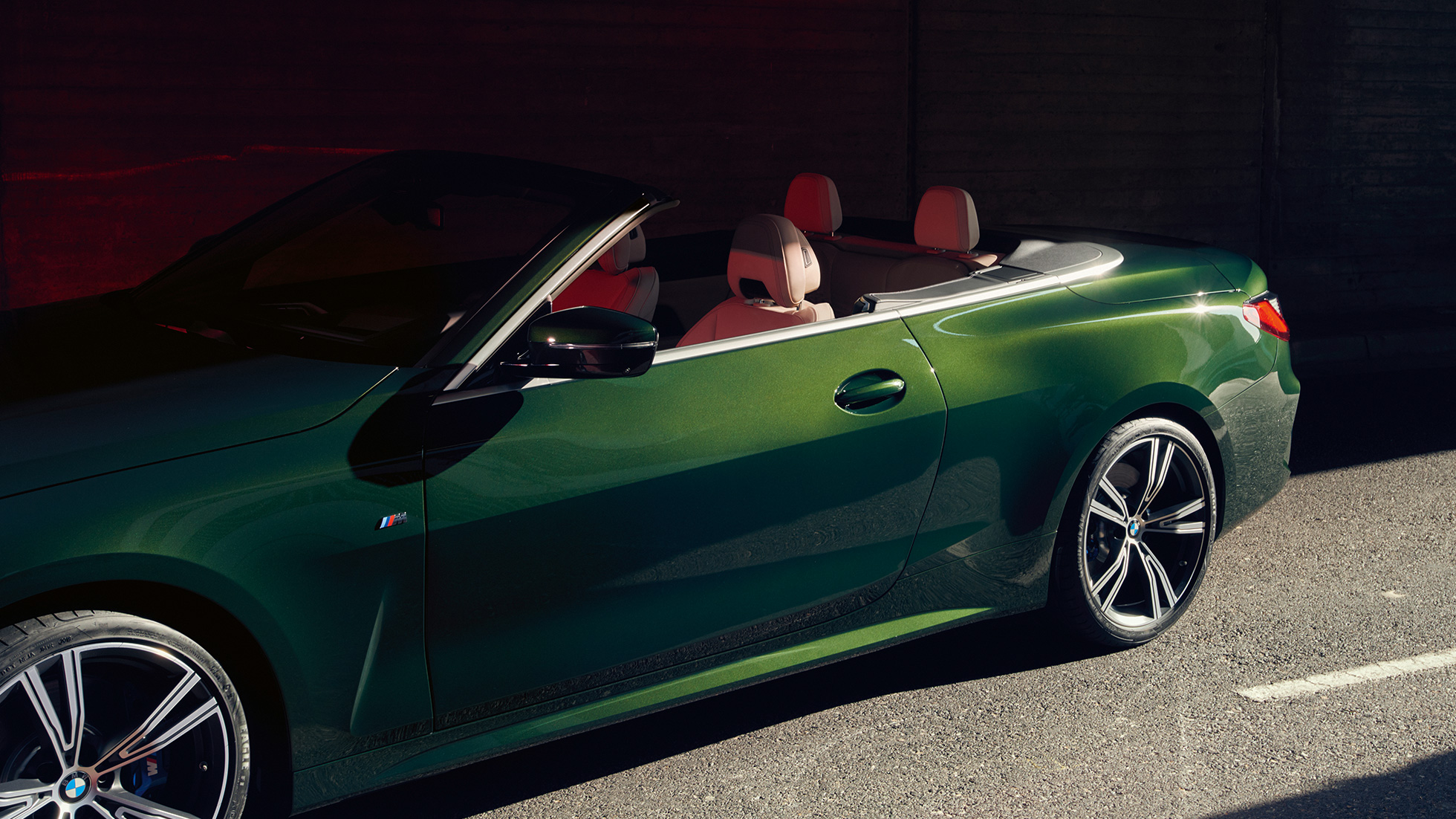 Woman driving a BMW 4 Series Convertible G23 2020 Woman driving a BMW 4 Series Convertible G23 2020 interior