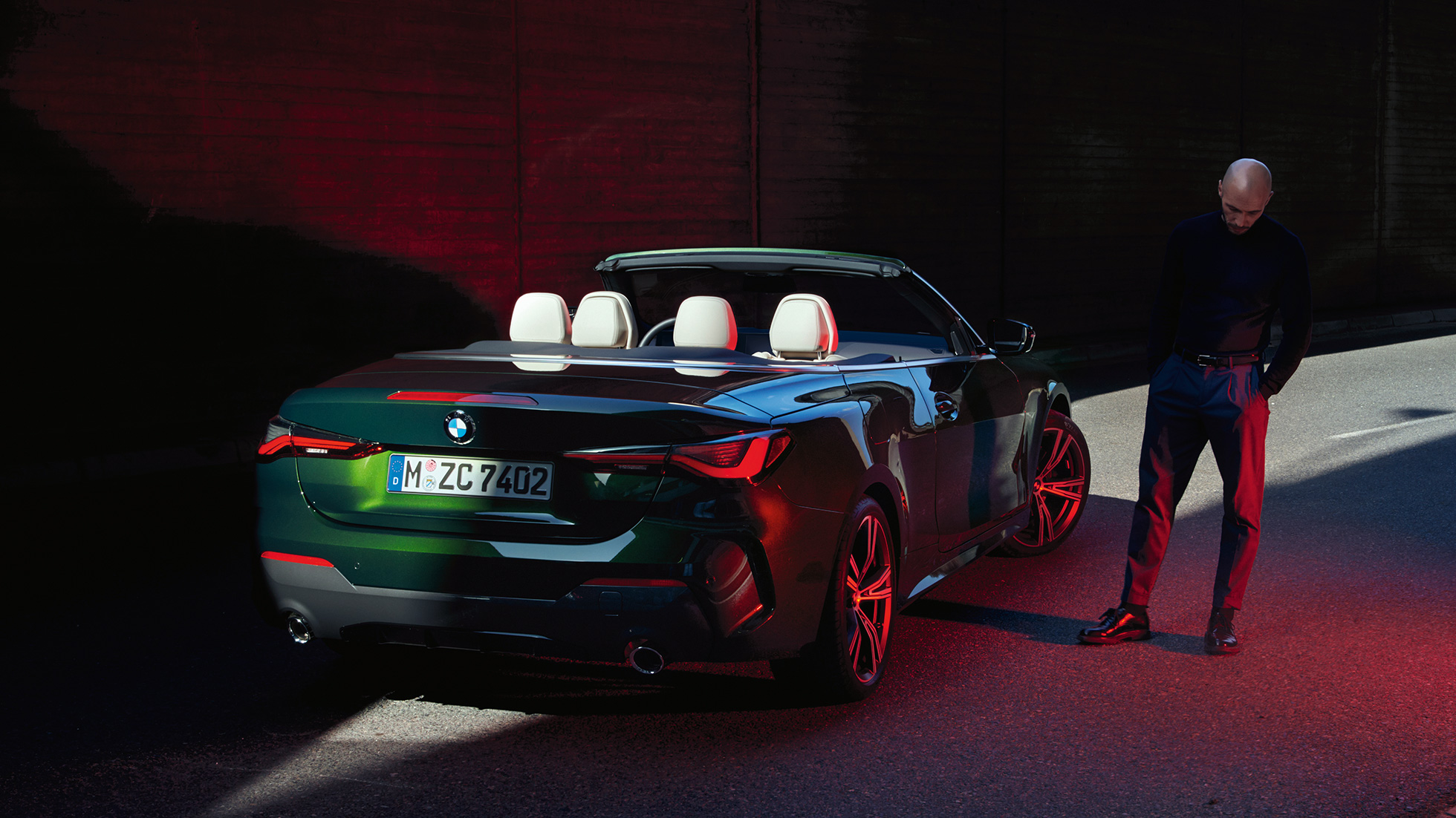 Three-quarter rear view with rear lights BMW 4 Series Convertible G23 2020 BMW 4 Series Convertible G23 2020 Sanremo Green metallic three-quarter rear view with rear lights