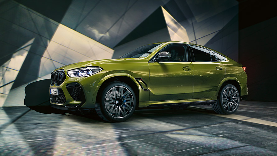 ภาพด้านข้างมุมมองสามส่วนสี่ของ BMW X6 M F96 ขณะจอด BMW M ซีรีส์ ภาพด้านข้างมุมมองสามส่วนสี่ของ BMW X6 M F96 ขณะจอด