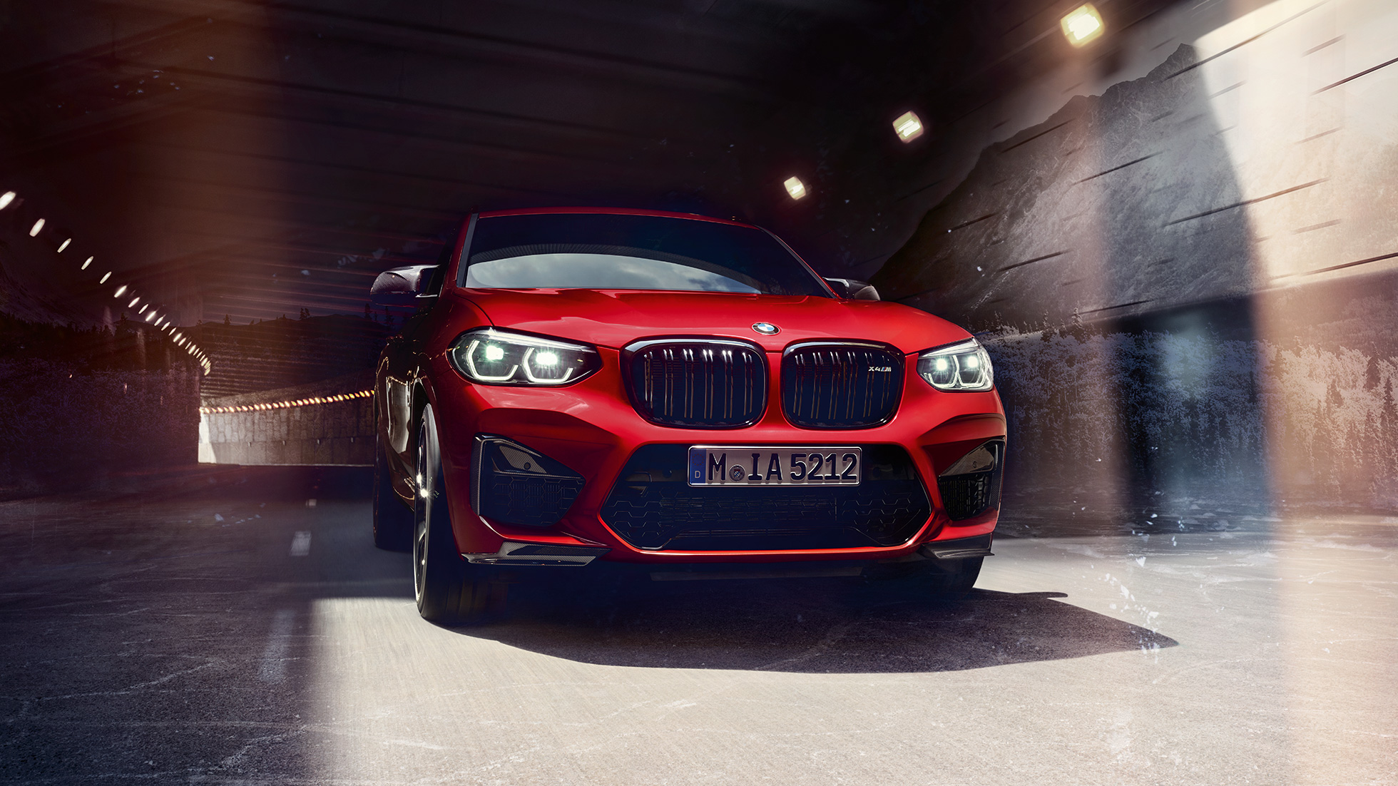 BMW X4 M, three-quarter front view. BMW X4 M in Toronto Red metallic, exterior, three-quarter front view.