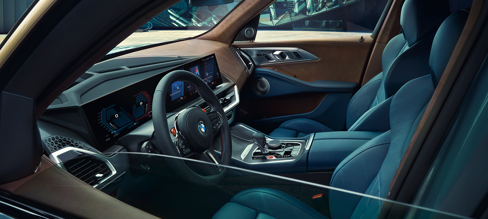 ห้องโดยสารส่วนหน้าและเทคโนโลยีของ BMW XM G09