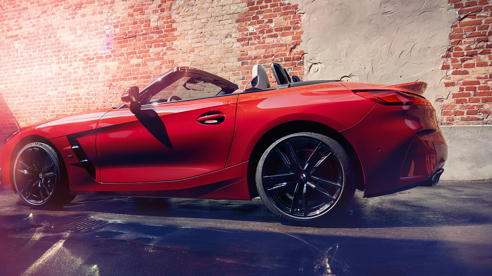 Side shot of the BMW Z4 Roadster Side shot of the BMW Z4 Roadster in front of a brick wall