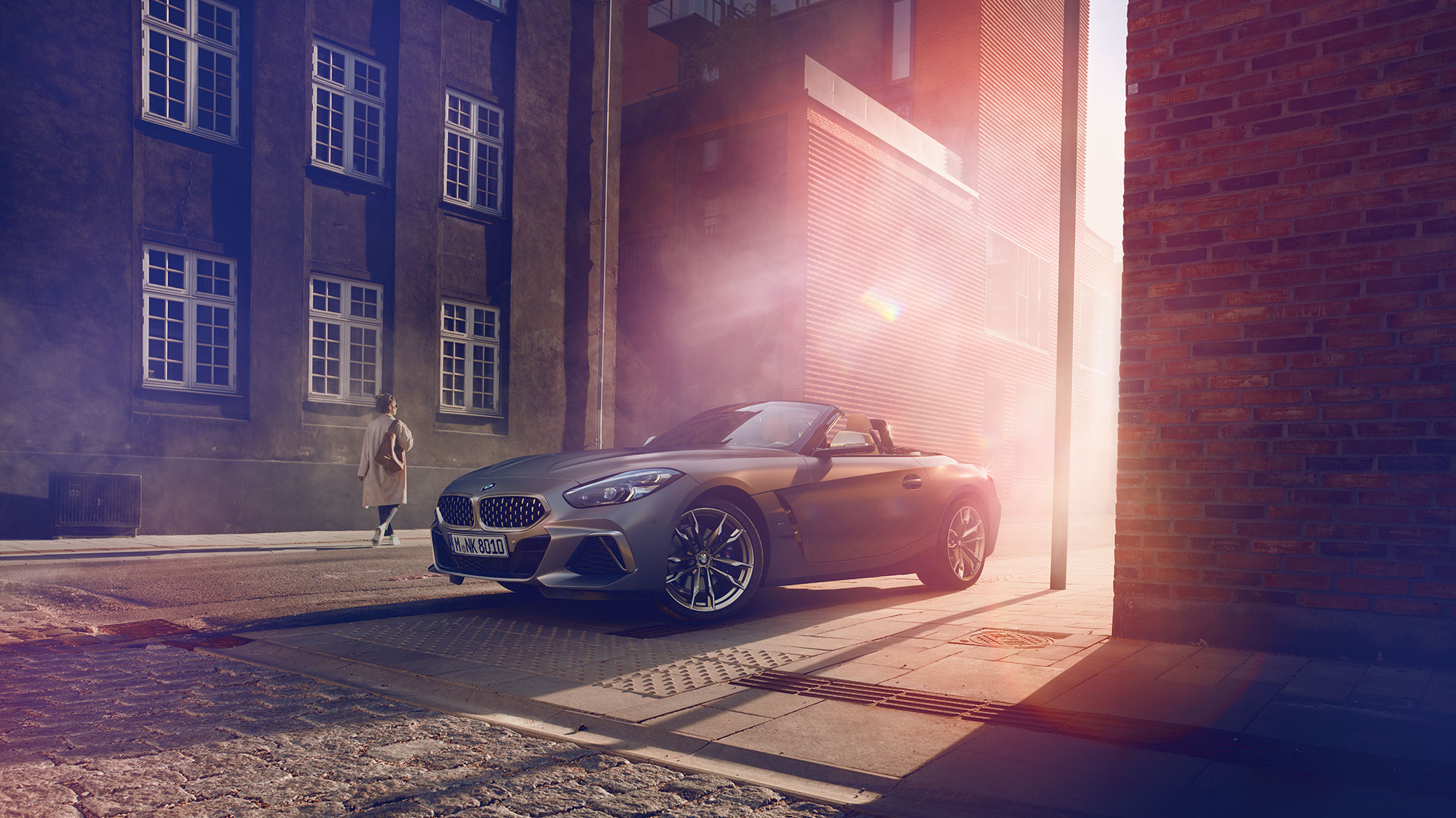 BMW Z4 Roadster in street Grey BMW Z4 Roadster in a street in front of a house