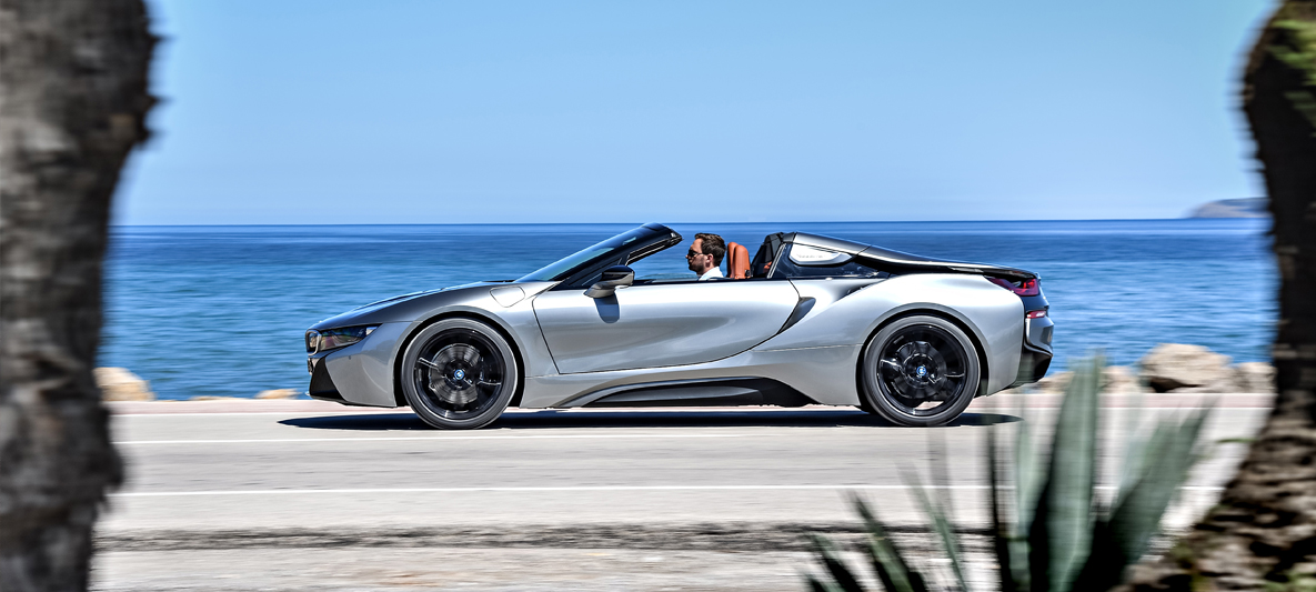 THE NEW BMW i8 Roadster. Clean wind in your hair. THE NEW BMW i8 Roadster. Clean wind in your hair.