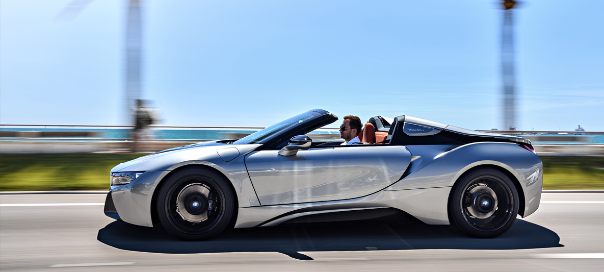 THE NEW BMW i8 Roadster. Clean wind in your hair. THE NEW BMW i8 Roadster. Clean wind in your hair.